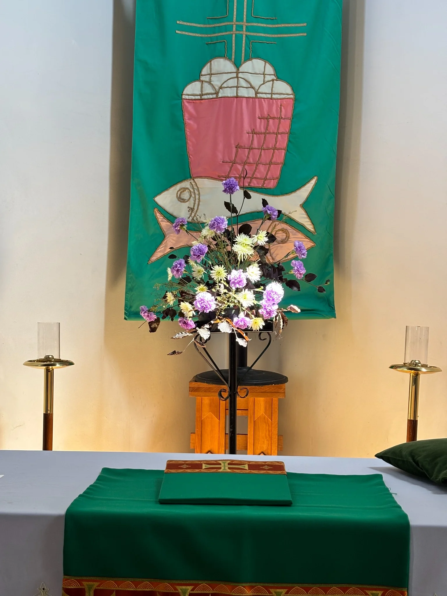 Church altar banner and flowers