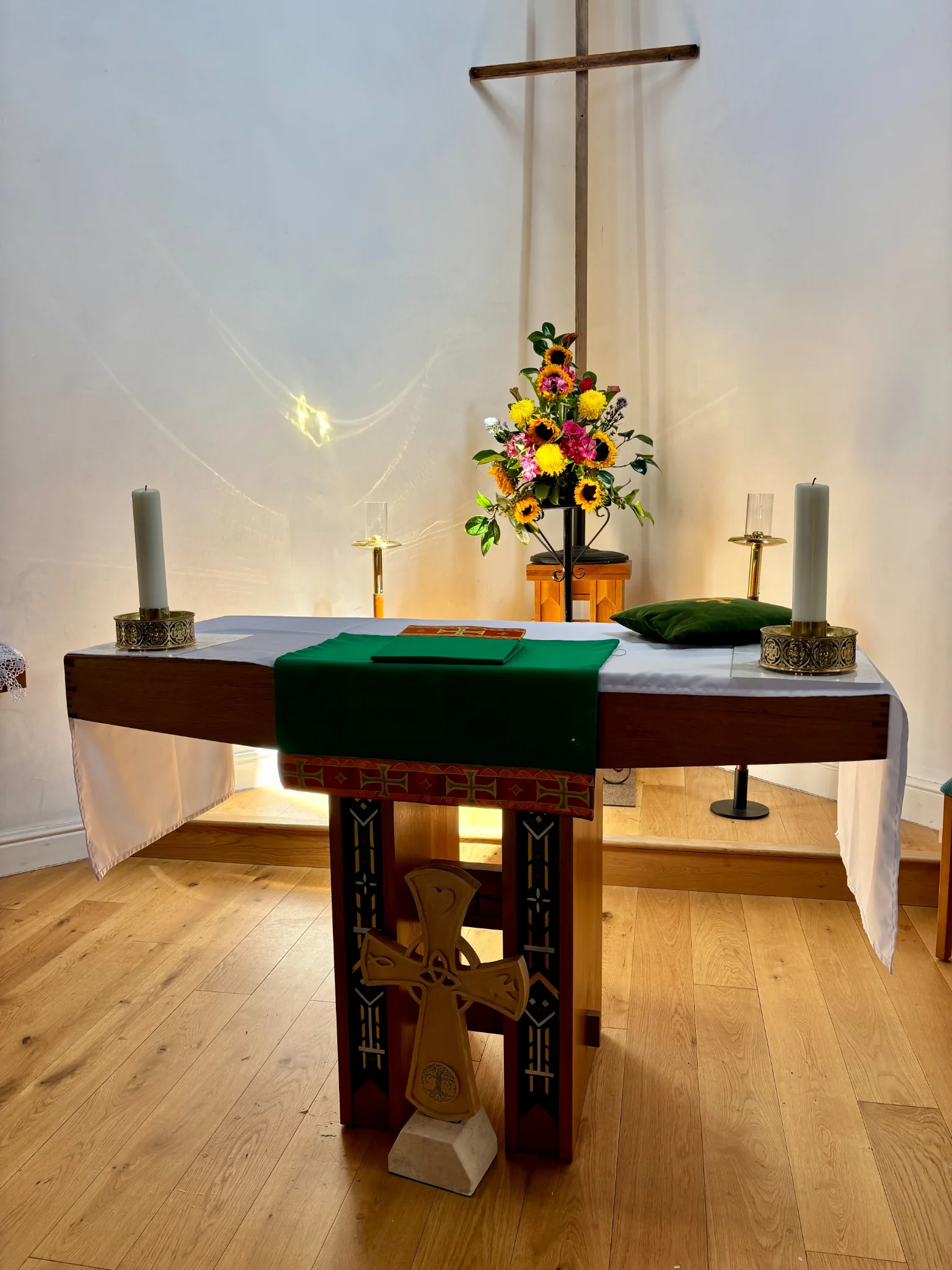 Church altar and cross at St Michael and All Angels